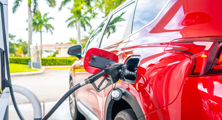 Fueling a red car